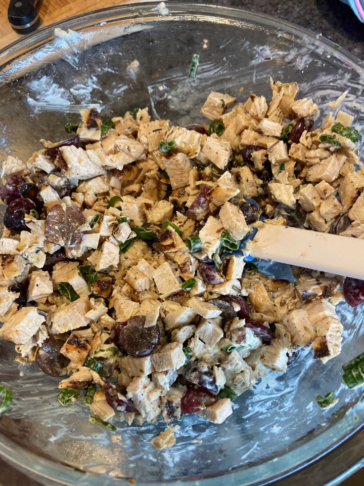 Mixing all of the chicken salad ingredients
